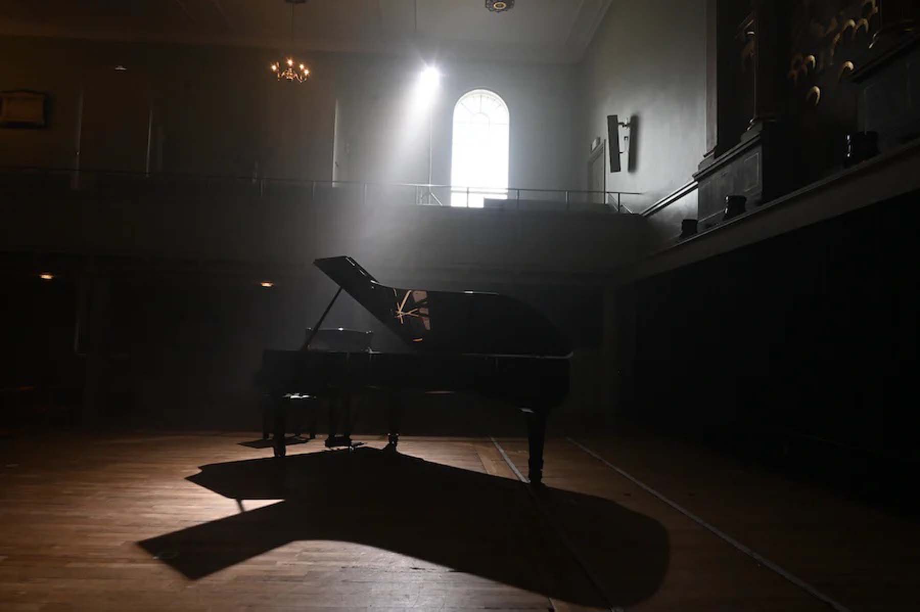 grand piano in moody light